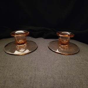 Pink depression glass candle holders. Has mild glow under 365 l8ght